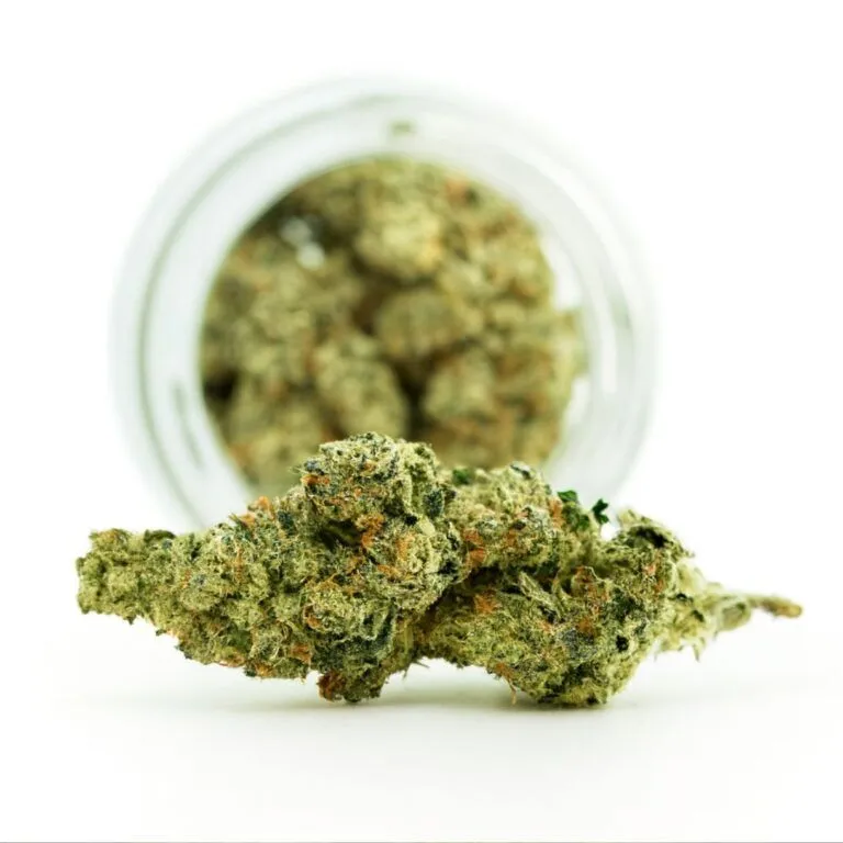 Photorealistic cannabis bud in sharp focus with natural green and orange hues, resting on a pure white background beside a blurred glass jar filled with similar buds.
