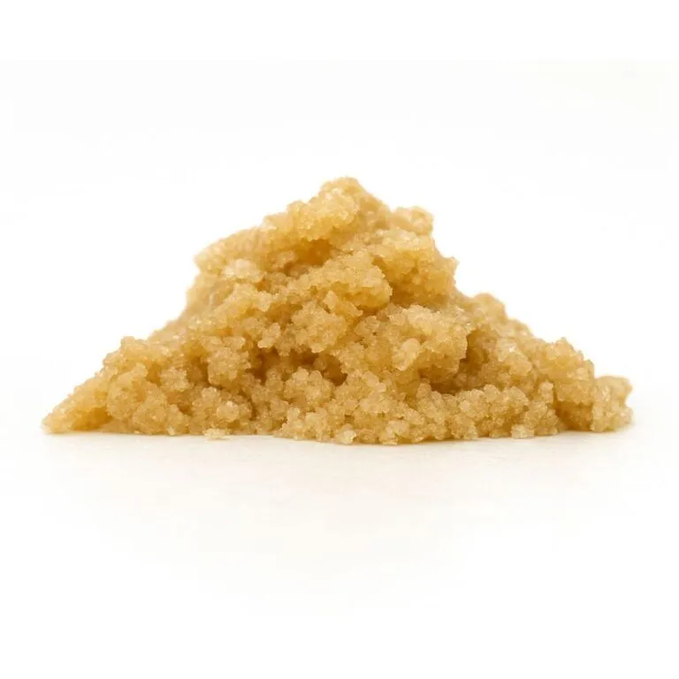 Light brown granular concentrate displayed in a small mound on a white background.