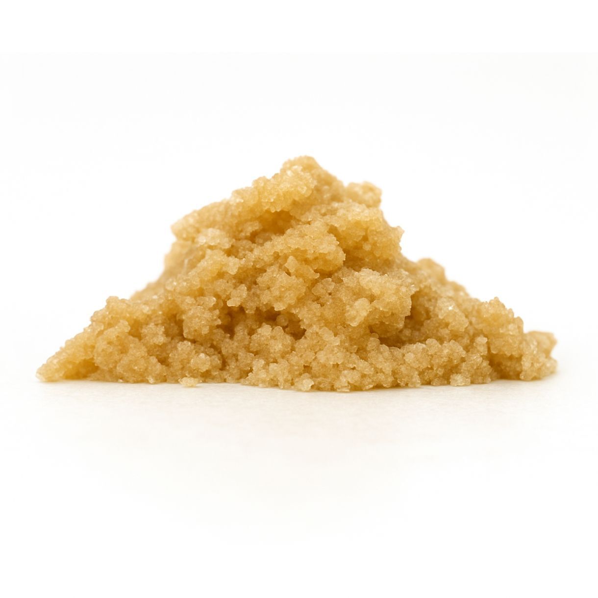 Light brown granular concentrate displayed in a small mound on a white background.