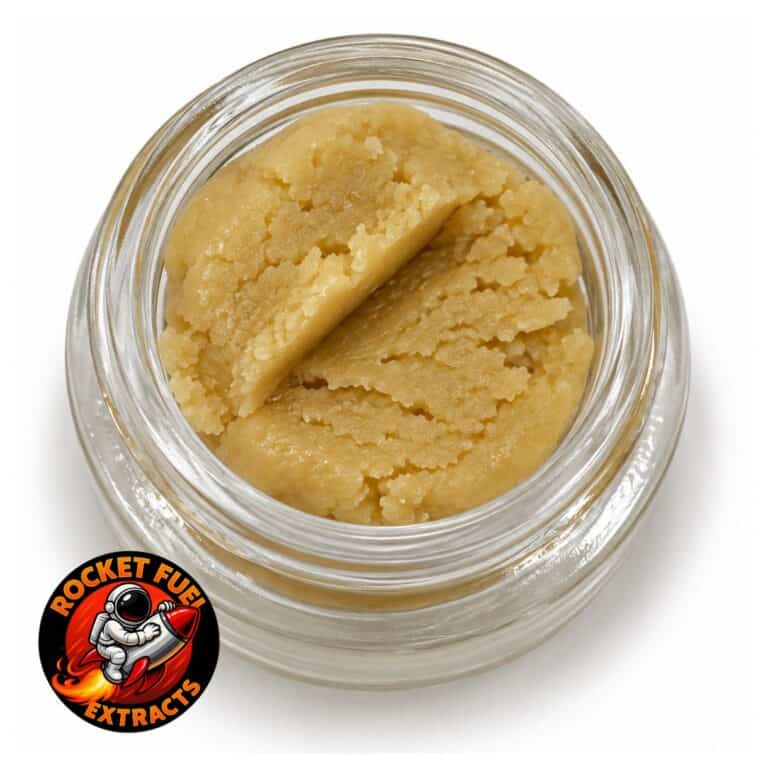 Pineapple Mintz Budder cannabis concentrate by Rocket Fuel Extracts in a glass jar on a white background.