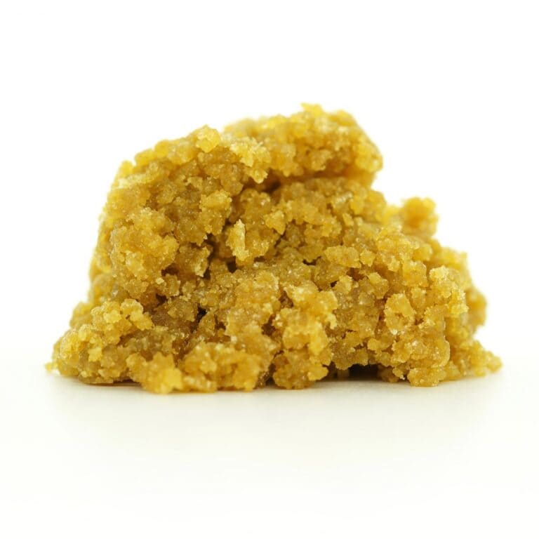 watermelon ice cream sugar wax photographed on a crisp white background with visible crystal texture and natural depth
