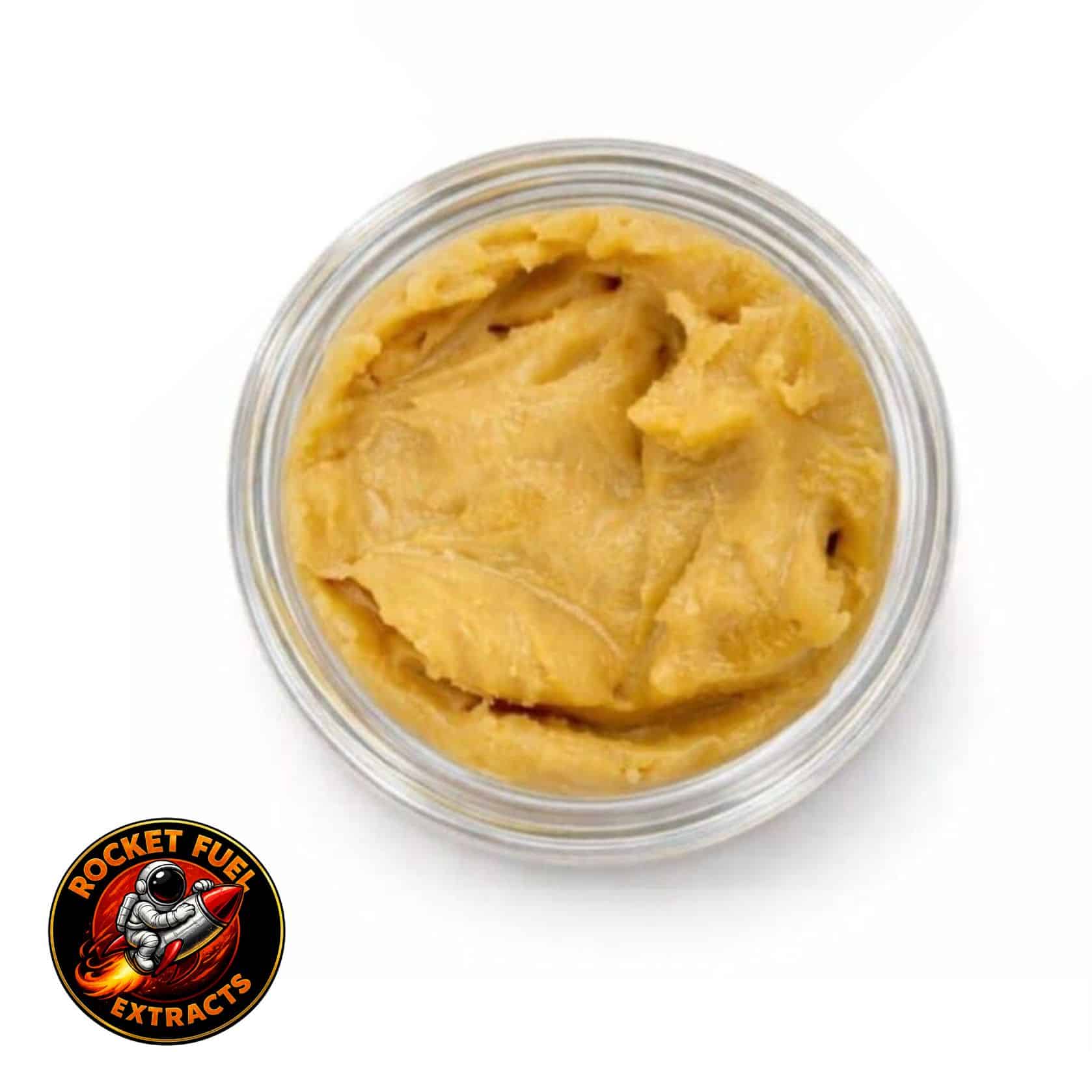 Open container of light-golden cannabis concentrate with a creamy, whipped texture on a white background.
