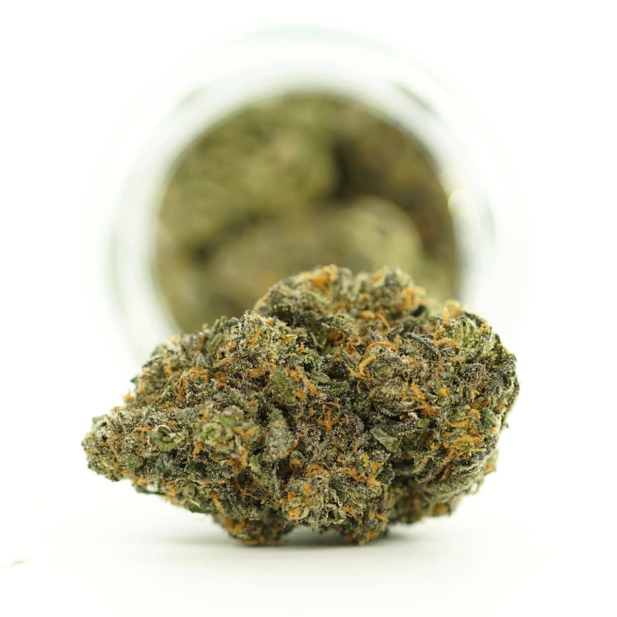 dd flow close-up image of cannabis bud with frosty trichomes on a crisp white background