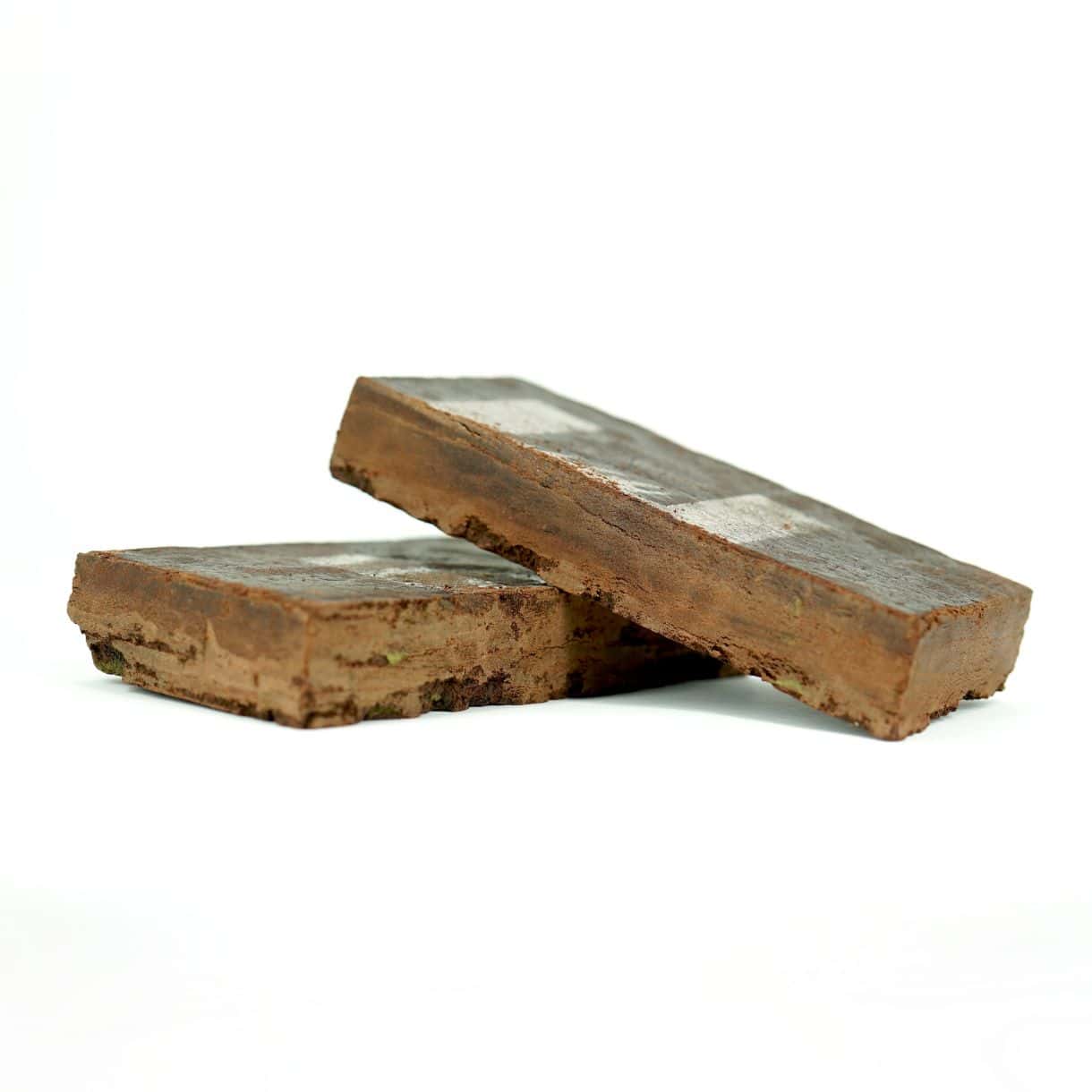 red lebanese hash Rectangular pressed hash block featuring a dark marbled finish and embossed branding