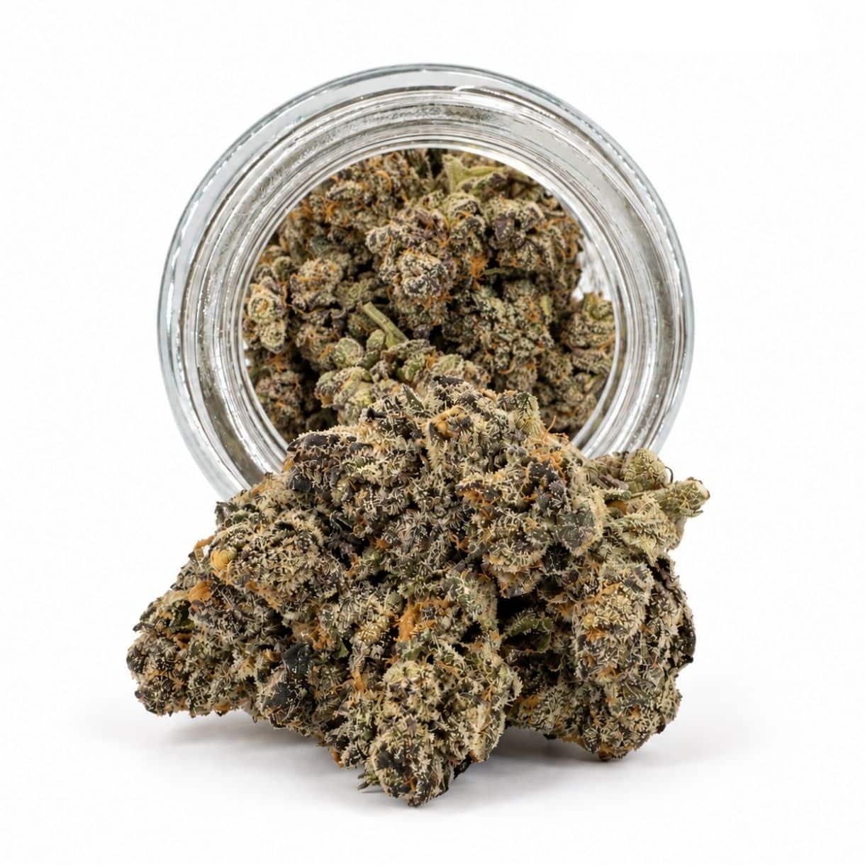 Dense cannabis flower with frosty trichomes in foreground, glass jar softly blurred on a crisp white background