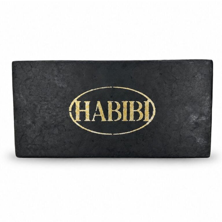 Rectangular pressed hash block featuring a dark marbled finish and embossed branding