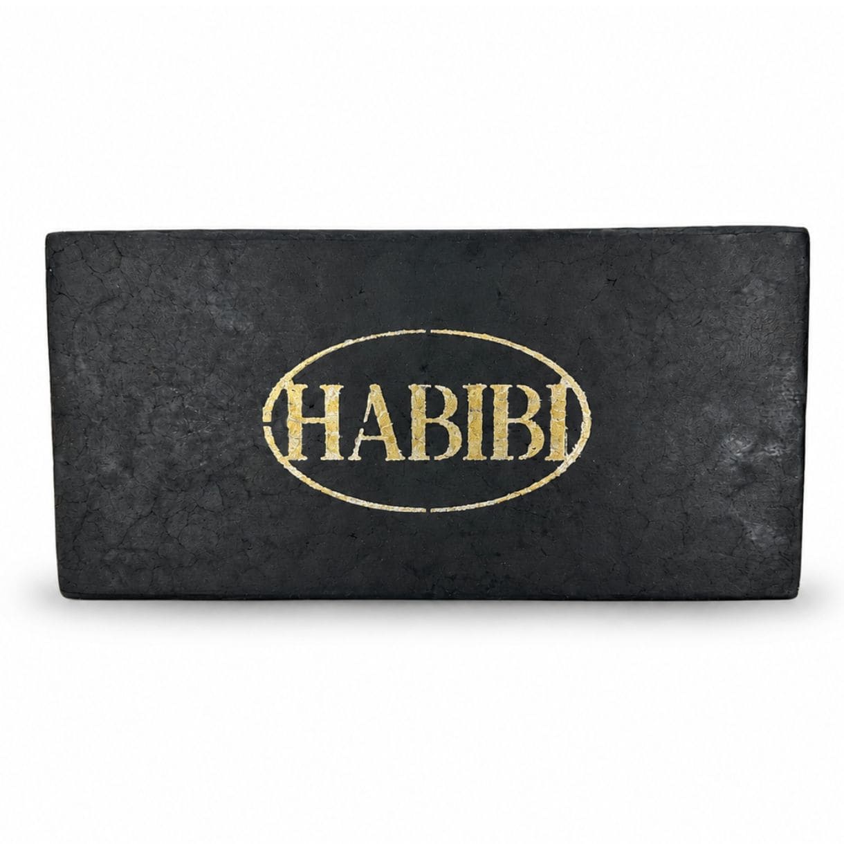 Rectangular pressed hash block featuring a dark marbled finish and embossed branding