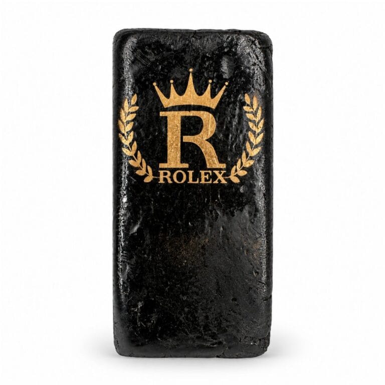 Rectangular pressed hash block featuring a dark marbled finish and embossed branding